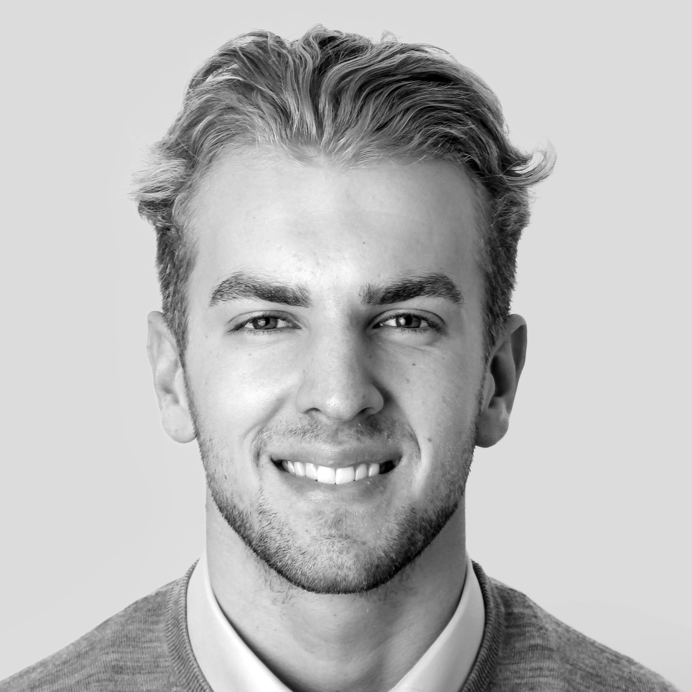 Headshot of Ben Tomkins